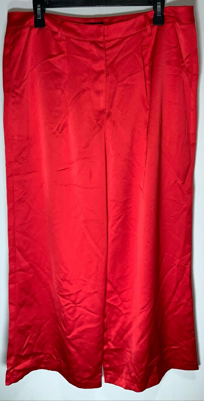 pair of red satin wide-leg trousers by the contemporary fashion brand Current Ai